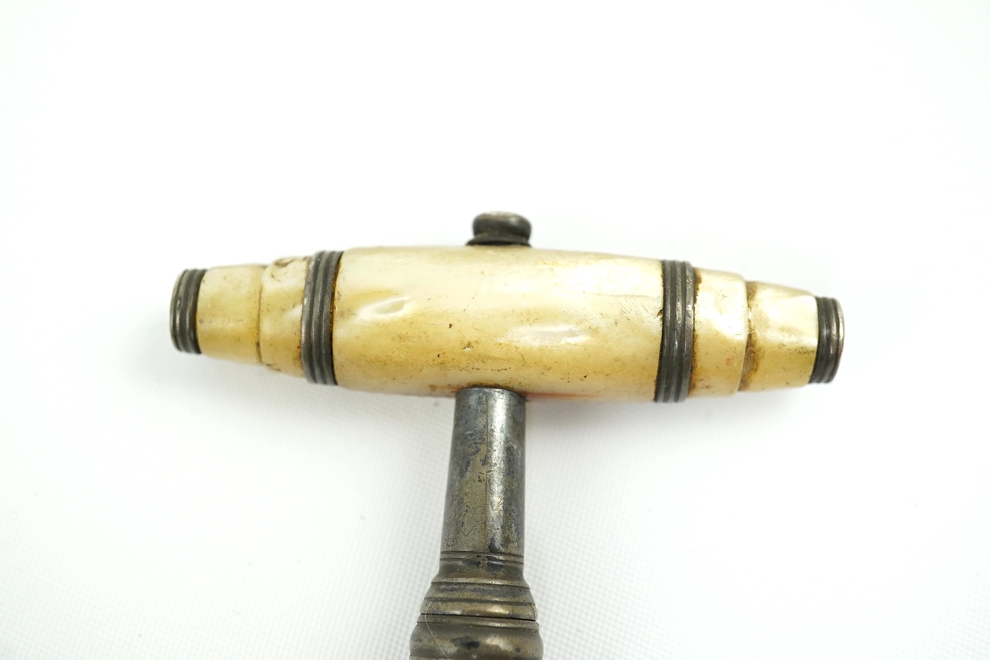 A George III silver and mother of pearl corkscrew by Samuel Pemberton